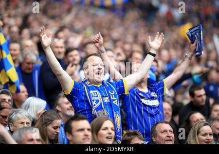 AFC Wimbledon fans show their support in the stands. Stock Photo