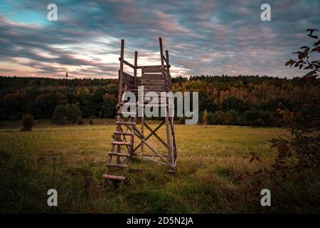 hunting hut ambush in the nature with long exposure sky in Őrség Hungary Stock Photo