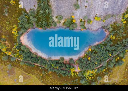 Glenmore, Scotland, UK. 14 October 2020. Autumn aerial view of An Lochan Uaine more commonly known as the Green Loch due to the striking green colour of it's water in Cairngorms National Park.  Iain Masterton/Alamy Live News