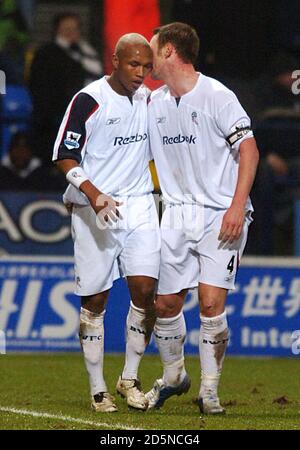Bolton Wanderers' El-Hadji Diouf celebrates his goal with Kevin Nolan Stock Photo