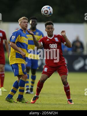 and Birmingham City's Josh Cogley battle for the ball Stock Photo - Alamy