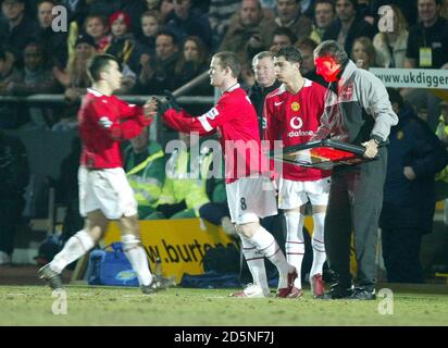 Manchester United's Wayne Rooney and Cristiano Ronaldo come on as subs during the game against Burton Albion Stock Photo