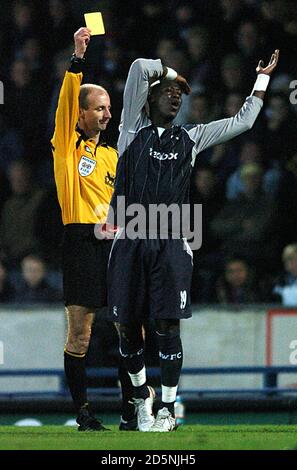 Bolton Wanderers' Khalilou Fadiga cannot believe it as he is booked by referee Mike Riley Stock Photo