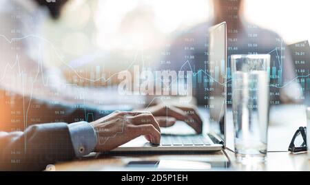 Creative Collage Of Business Team Working On Project And Stock Markets Data Stock Photo