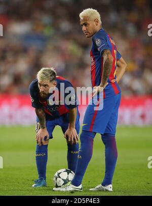 Barcelona's Lionel Messi (left) and Junior Neymar prepare to take a free kick  Stock Photo