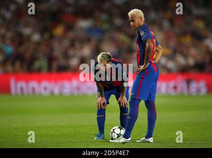 Barcelona's Lionel Messi (left) and Junior Neymar prepare to take a free kick  Stock Photo