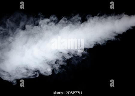 a jet of smoke on a black background Stock Photo