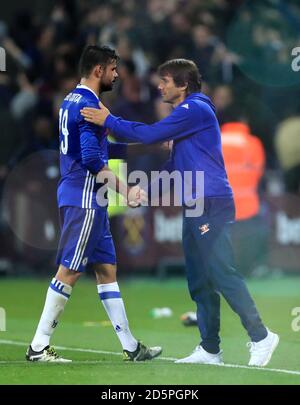 Chelsea manager Antonio Conte shakes the match officials' hands after ...