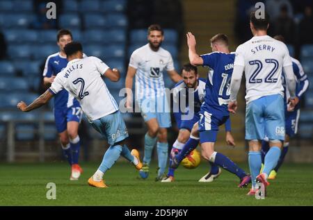 Coventry City's Jordan Willis (left) scores the opening goal Stock Photo