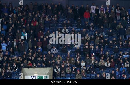 Burnley fans in the away end of the ground Stock Photo