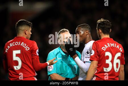 Manchester United's Marcos Rojo speaks with West Ham United's Diafra Sakho Stock Photo