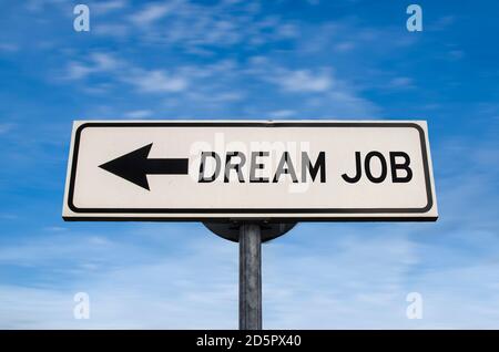 Dream job road sign, arrow on blue sky background. One way blank road sign with copy space. Arrow on a pole pointing in one direction. Search for bett Stock Photo
