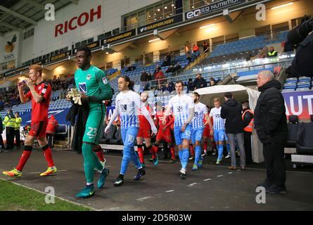 Coventry City goalkeeper Reice Charles-Cook heads out onto the pitch  Stock Photo