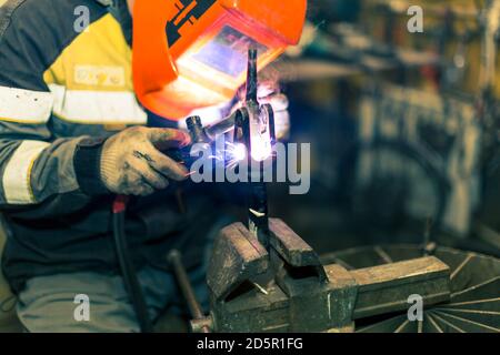 TIG welding of aluminum part for a passenger car Stock Photo