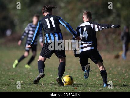 Chorleywood Common Youth Hurricane U15's (black and white kit) v Berkhamsted Raiders Black U15's (blue and black kit) at Chorleywood House, Hertfordshire.  Stock Photo