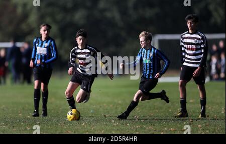 Chorleywood Common Youth Hurricane U15's (black and white kit) v Berkhamsted Raiders Black U15's (blue and black kit) at Chorleywood House, Hertfordshire.  Stock Photo