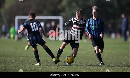 Chorleywood Common Youth Hurricane U15's (black and white kit) v Berkhamsted Raiders Black U15's (blue and black kit) at Chorleywood House, Hertfordshire.  Stock Photo