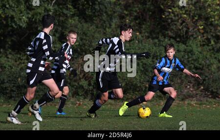 Chorleywood Common Youth Hurricane U15's (black and white kit) v Berkhamsted Raiders Black U15's (blue and black kit) at Chorleywood House, Hertfordshire.  Stock Photo