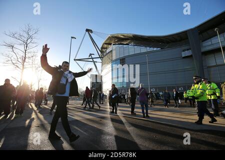 Fans outside the Etihad Stadium before the game