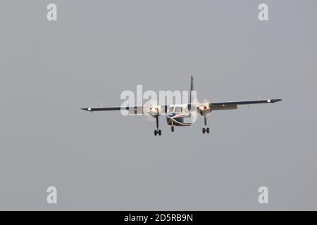 Twin engined aircraft coming in to land on the mainland from the Fresian Islands. October 2020. Lower Saxony, Germany Stock Photo