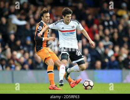 Fulham's Lucas Piazon (right) and Hull City's Lazar Markovic battle for the ball Stock Photo