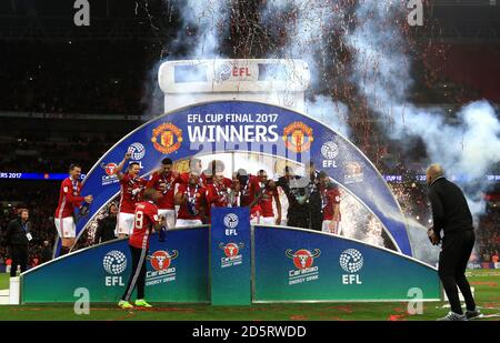 Manchester United players celebrate winning the EFL Cup Trophy  Stock Photo
