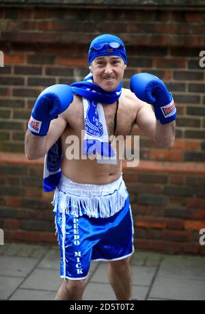 Everton fan Speedo Mick dressed in boxing gear outside the ground Stock Photo