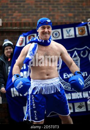 Everton fan Speedo Mick dressed in boxing gear outside the ground Stock Photo