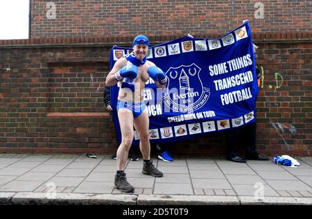 Everton fan Speedo Mick dressed in boxing gear outside the ground Stock Photo