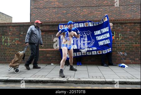 Everton fan Speedo Mick dressed in boxing gear outside the ground Stock Photo