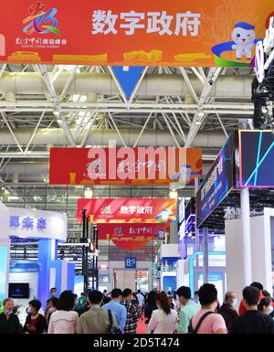 Fuzhou. 14th Oct, 2020. Photo taken on Oct. 14, 2020 shows a view at an achievement expo on the 3rd Digital China Summit in Fuzhou, capital of southeast China's Fujian Province. The 3rd Digital China Summit closed in Fuzhou on Wednesday. A total of 426 projects in the digital sector involving a total investment of 331.6 billion yuan (about 49 billion U.S. dollars) were signed at this year's Digital China Summit. The projects cover fields such as artificial intelligence, 5G, industrial Internet, and blockchain. Credit: Xinhua/Alamy Live News Stock Photo