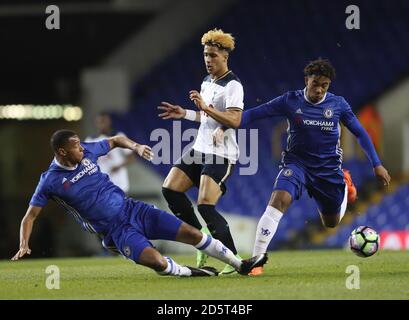 Tottenham Hotspur's U18's Keanan Bennetts is tackled by Chelsea's U18's Joshua Grant Stock Photo