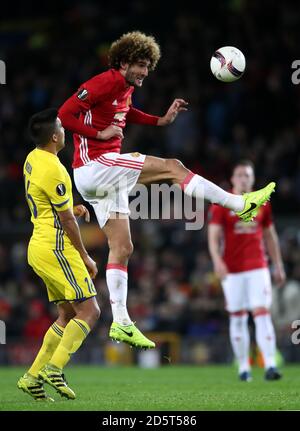 Manchester United's Marouane Fellaini (right) and FC Rostov's Cristian Noboa battle for the ball 