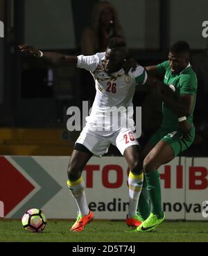 Senegal's Salif Sane, (left) battles for possession of the ball with Nigeria's Kelechi Iheanacho, (right) Stock Photo