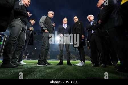 Borussia Dortmund's CEO Hans-Joachim Watzke (centre) speaks to the media after the game is postponed Stock Photo