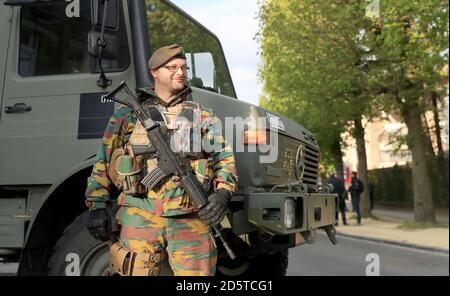 Soilders outside Constant Vanden Stock Stadium ahead of the game Stock Photo