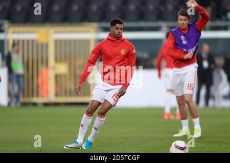 Manchester United's Marcus Rashford warms up ahead of the game Stock Photo