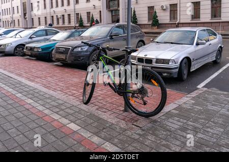 01 05 2020 Gomel, Republic of Belarus. the bike is parked on the street in the city center Stock Photo