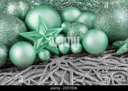 Christmas decoration ornaments and stars on silver background Stock Photo