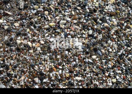Close-up of beach pebbles. abstract smooth round pebbles sea texture background Stock Photo