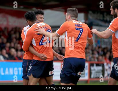 Luton Town's James Justin (left) celebrates with team-mate Isaac Vassell after he scores his sides first goal Stock Photo