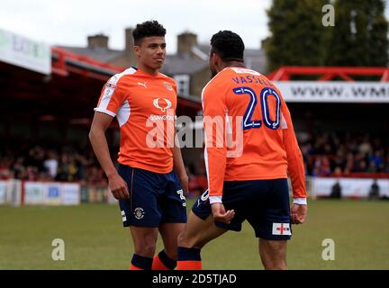 Luton Town's James Justin (Left) celebrates with team-mate Isaac Vassell (right) after he scores his sides first goal Stock Photo