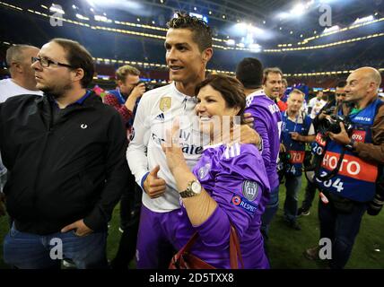 Real Madrid's Cristiano Ronaldo celebrates with his mother, Maria Dolores dos Santos Aveiro after the 2017 Champions League Final held at the National Stadium, Cardiff Stock Photo