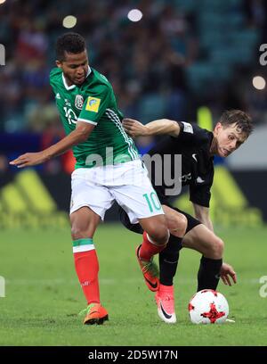 Mexico's Giovani dos Santos (left) and New Zealand's Michael McGlinchey battle for the ball  Stock Photo