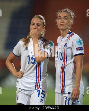 Iceland's Elin Jensen (left) and Dagny Brynjarsdottir (right) appear ...