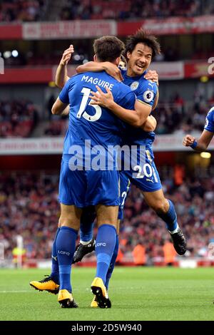 Leicester City S Shinji Okazaki Celebrates Scoring His Side S First Goal Of The Game With His Team Mates Stock Photo Alamy