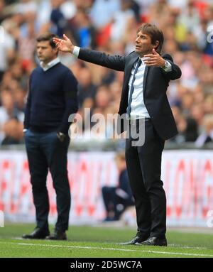 Chelsea manager Mauricio Pochettino (right) during the Premier League ...