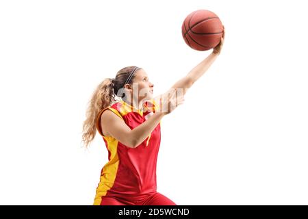 Young female basketball player laying the ball with one hand isolated on white background Stock Photo