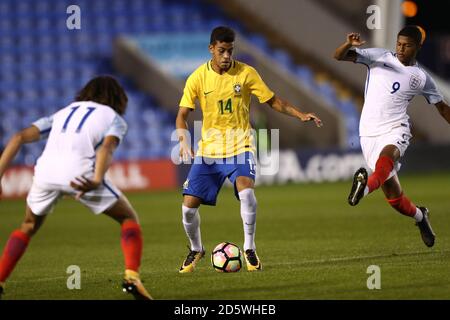 Brazil's Matheus Stockl battle for the ball with England's Nya Kirby (left) and Rhian Brewster. Stock Photo
