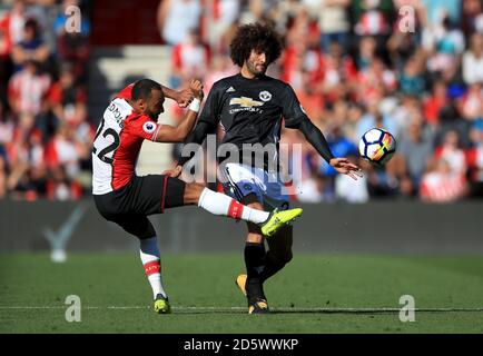 Southampton's Nathan Redmond (left) and Manchester United's Marouane Fellaini (right) battle for the ball